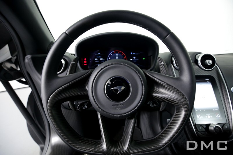 DMC Forged Carbon Fiber Interior Kit: Steering Wheel, Center Console Cover, Media Frame, Inner Door Trims, Pilot Dashboard for McLaren GT