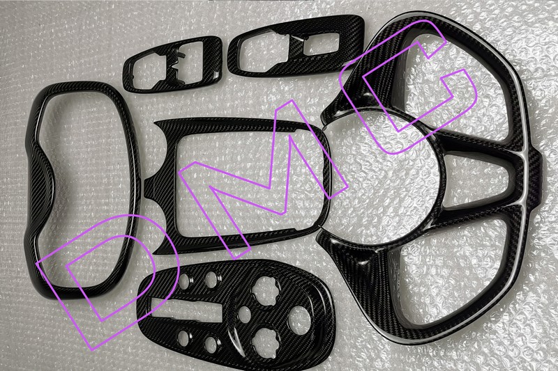 DMC Forged Carbon Fiber Interior Kit: Steering Wheel, Center Console Cover, Media Frame, Inner Door Trims, Pilot Dashboard for McLaren GT - Image 6